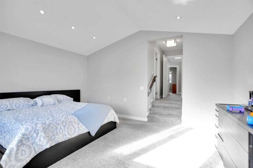 33 Douglasbank Rise Se, Calgary, AB - Indoor Photo Showing Bedroom