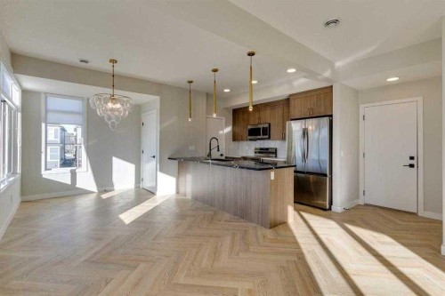 102-14800 1 Street, Calgary, AB - Indoor Photo Showing Kitchen With Upgraded Kitchen