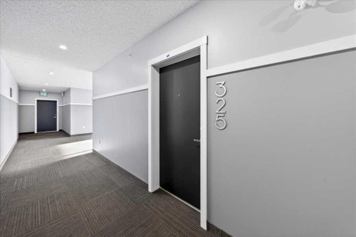 325-245 Edith Place Nw, Calgary, AB - Indoor Photo Showing Other Room
