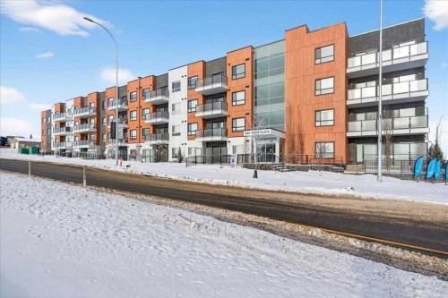 325-245 Edith Place Nw, Calgary, AB - Outdoor With Balcony With Facade