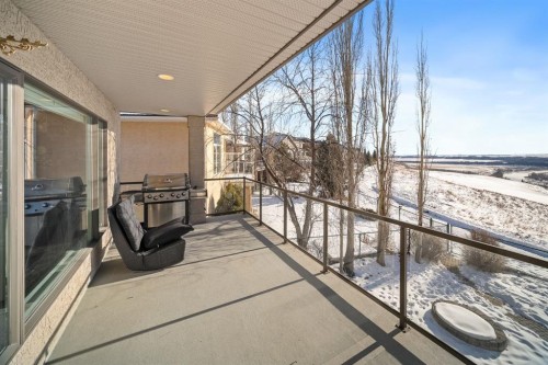 158 Gleneagles View, Cochrane, AB - Outdoor With Balcony With Exterior