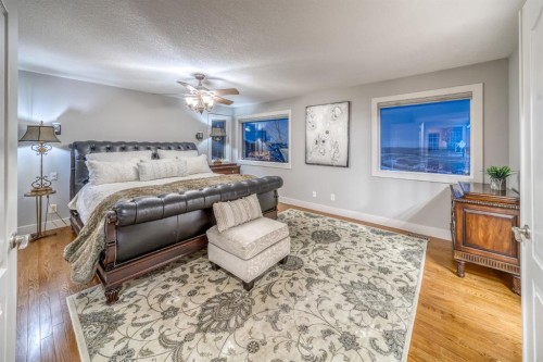 158 Gleneagles View, Cochrane, AB - Indoor Photo Showing Bedroom