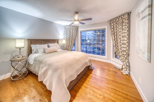 158 Gleneagles View, Cochrane, AB - Indoor Photo Showing Bedroom