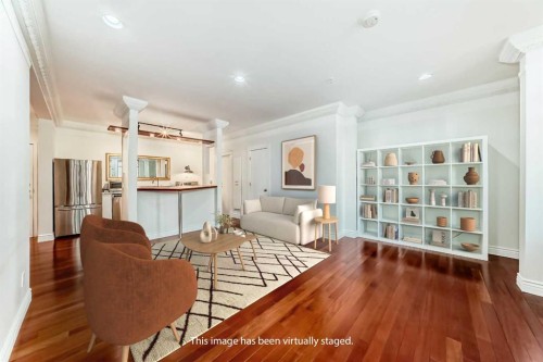 111-1410 2 Street Sw, Calgary, AB - Indoor Photo Showing Living Room