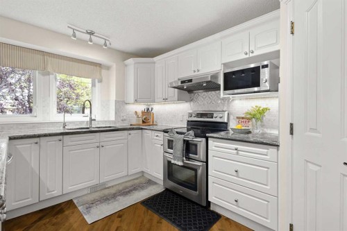15209 Prestwick Boulevard Se, Calgary, AB - Indoor Photo Showing Kitchen With Upgraded Kitchen