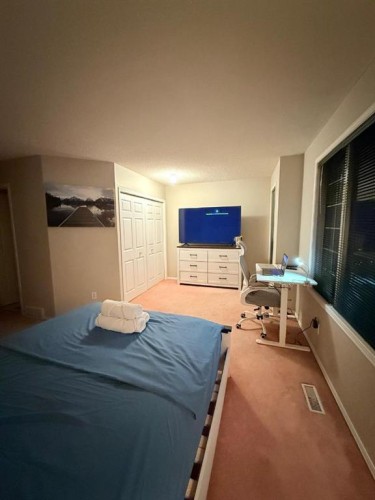 7212 Sierra Morena Boulevard Sw, Calgary, AB - Indoor Photo Showing Bedroom