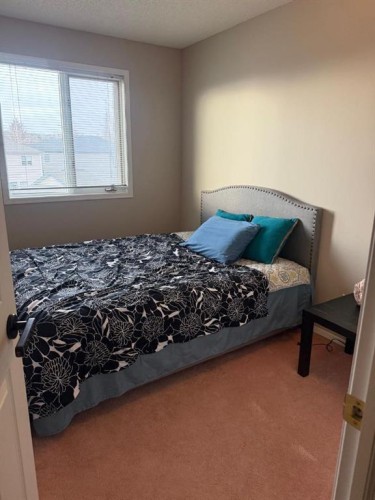 7212 Sierra Morena Boulevard Sw, Calgary, AB - Indoor Photo Showing Bedroom