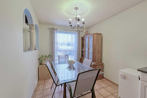 24 Shawmeadows Road Sw, Calgary, AB - Indoor Photo Showing Dining Room