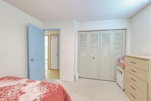 24 Shawmeadows Road Sw, Calgary, AB - Indoor Photo Showing Bedroom