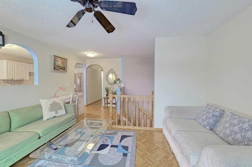24 Shawmeadows Road Sw, Calgary, AB - Indoor Photo Showing Living Room