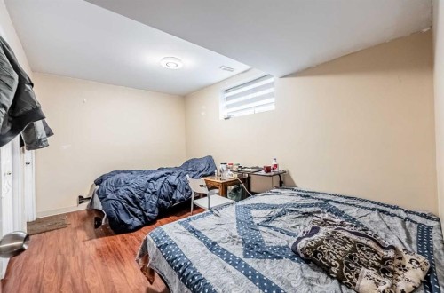 913 Taradale Drive Ne, Calgary, AB - Indoor Photo Showing Bedroom