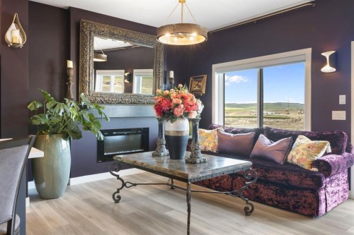 255 Heritage Heights, Cochrane, AB - Indoor Photo Showing Living Room