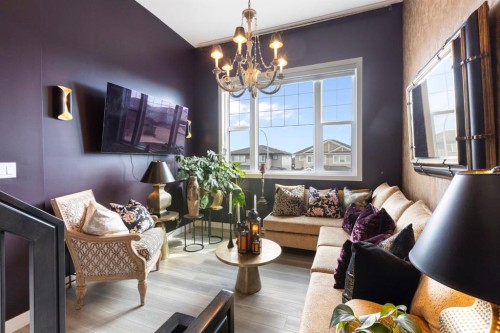 255 Heritage Heights, Cochrane, AB - Indoor Photo Showing Living Room
