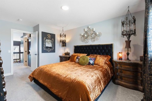 255 Heritage Heights, Cochrane, AB - Indoor Photo Showing Bedroom