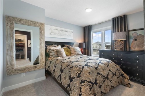 255 Heritage Heights, Cochrane, AB - Indoor Photo Showing Bedroom