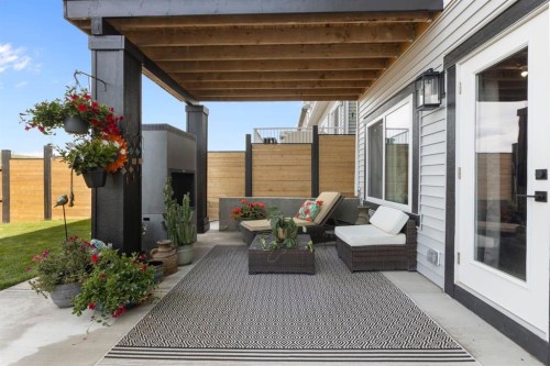 255 Heritage Heights, Cochrane, AB - Outdoor With Deck Patio Veranda With Exterior