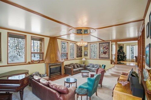 242016 White Post Lane, Rural Foothills County, AB - Indoor With Fireplace