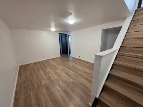 59 Brookpark Crescent Sw, Calgary, AB - Indoor Photo Showing Other Room