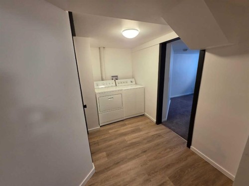 59 Brookpark Crescent Sw, Calgary, AB - Indoor Photo Showing Laundry Room