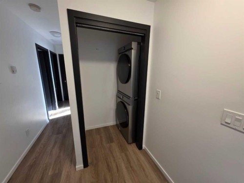 59 Brookpark Crescent Sw, Calgary, AB - Indoor Photo Showing Laundry Room