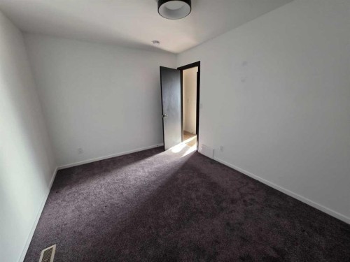 59 Brookpark Crescent Sw, Calgary, AB - Indoor Photo Showing Other Room