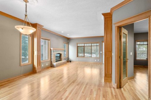12 Prominence Point Sw, Calgary, AB - Indoor With Fireplace