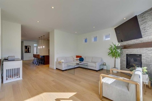 3529 40 Street Sw, Calgary, AB - Indoor Photo Showing Living Room With Fireplace