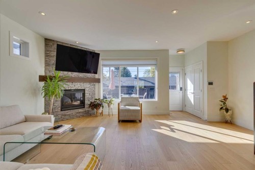 3529 40 Street Sw, Calgary, AB - Indoor Photo Showing Living Room With Fireplace