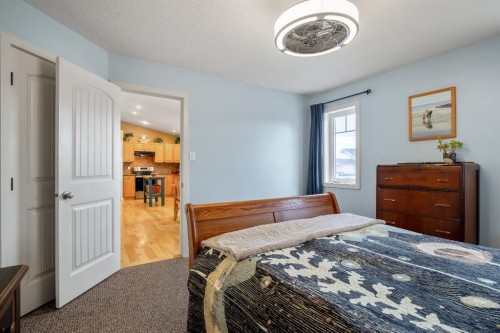 2103 27 Avenue, Nanton, AB - Indoor Photo Showing Bedroom