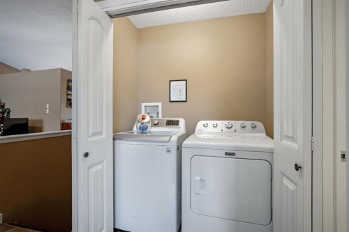 2103 27 Avenue, Nanton, AB - Indoor Photo Showing Laundry Room