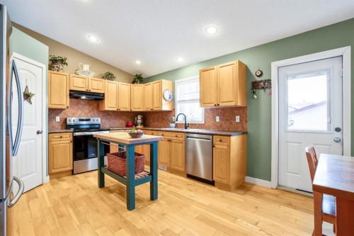 2103 27 Avenue, Nanton, AB - Indoor Photo Showing Kitchen