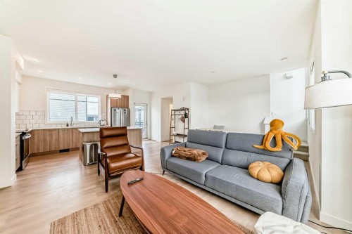 505-857 Belmont Drive Sw, Calgary, AB - Indoor Photo Showing Living Room