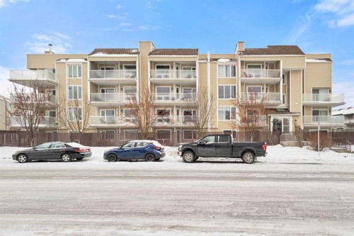 101-3747 42 Street Nw, Calgary, AB - Outdoor With Balcony With Facade