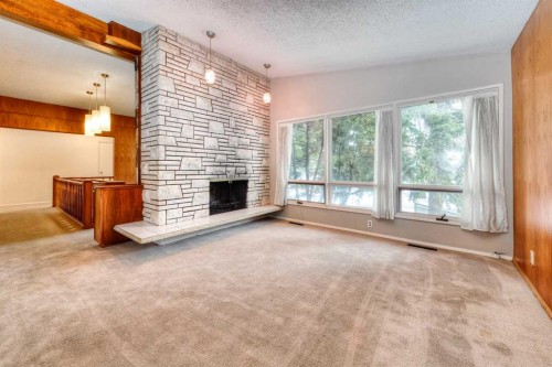 6729 Leeson Court Sw, Calgary, AB - Indoor With Fireplace