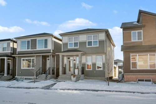 551 Wolf Creek Way Se, Calgary, AB - Outdoor With Facade