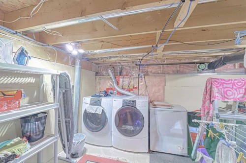 102 Coventry Crescent Ne, Calgary, AB - Indoor Photo Showing Laundry Room