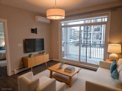 217-30 Walgrove Se, Calgary, AB - Indoor Photo Showing Living Room