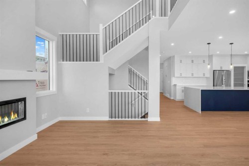 239 Chelsea  Park, Chestermere, AB - Indoor With Fireplace