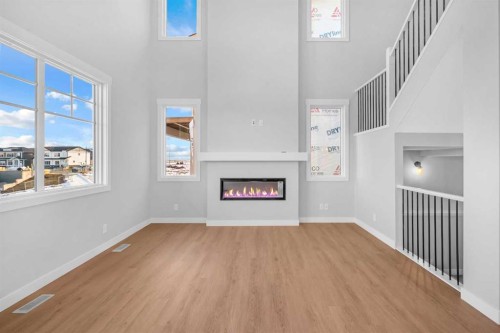239 Chelsea  Park, Chestermere, AB - Indoor With Fireplace
