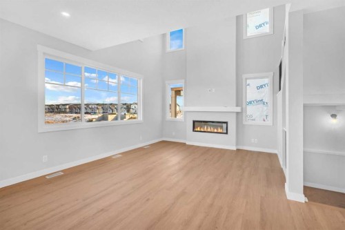239 Chelsea  Park, Chestermere, AB - Indoor With Fireplace
