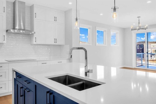 239 Chelsea  Park, Chestermere, AB - Indoor Photo Showing Kitchen With Double Sink With Upgraded Kitchen