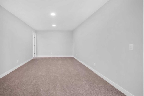 239 Chelsea  Park, Chestermere, AB - Indoor Photo Showing Other Room