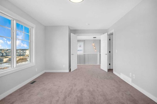 239 Chelsea  Park, Chestermere, AB - Indoor Photo Showing Other Room