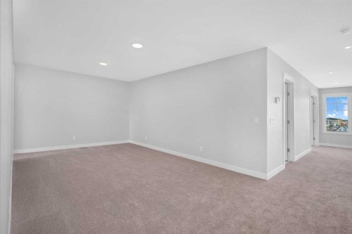 239 Chelsea  Park, Chestermere, AB - Indoor Photo Showing Other Room