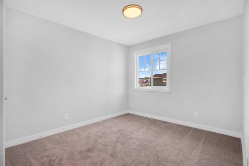 239 Chelsea  Park, Chestermere, AB - Indoor Photo Showing Other Room