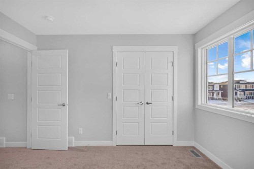 239 Chelsea  Park, Chestermere, AB - Indoor Photo Showing Other Room