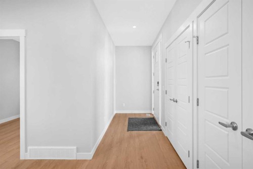 239 Chelsea  Park, Chestermere, AB - Indoor Photo Showing Other Room