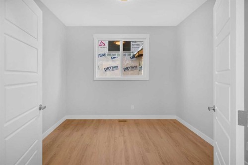 239 Chelsea  Park, Chestermere, AB - Indoor Photo Showing Other Room