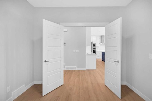 239 Chelsea  Park, Chestermere, AB - Indoor Photo Showing Other Room