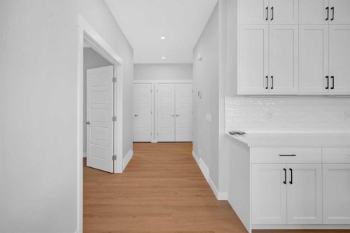 239 Chelsea  Park, Chestermere, AB - Indoor Photo Showing Other Room